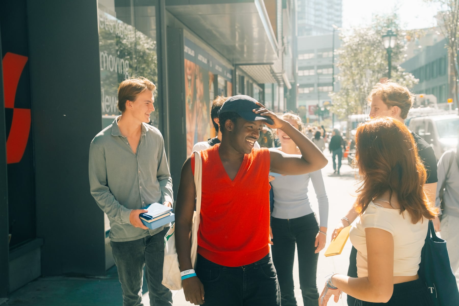 Friends walking through a city together