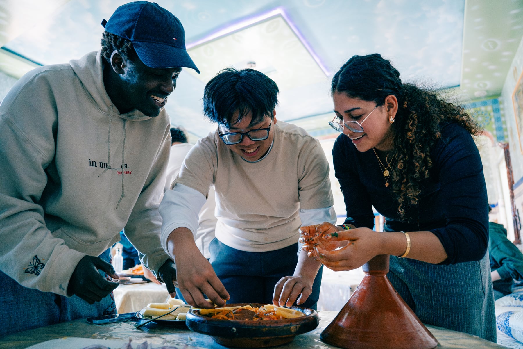 Friends cooking together